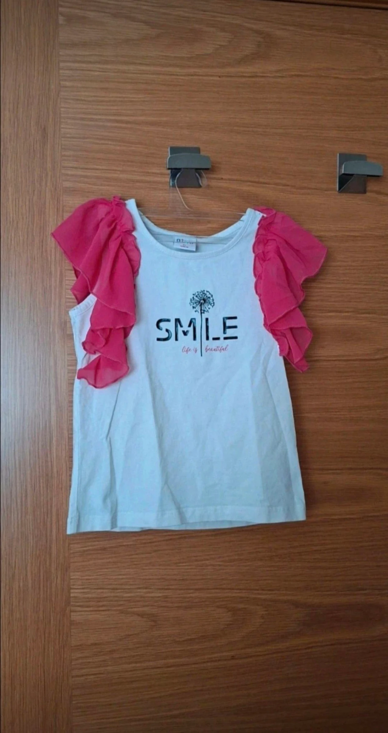 Camiseta de niña. Adorno de tul. Talla 4 años